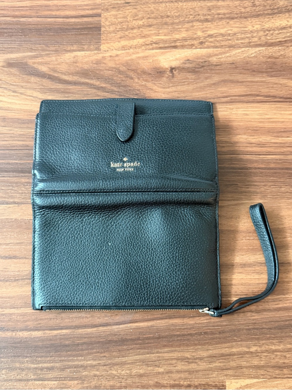 kate spade black pebble leather wristlet wallet with gold logo
